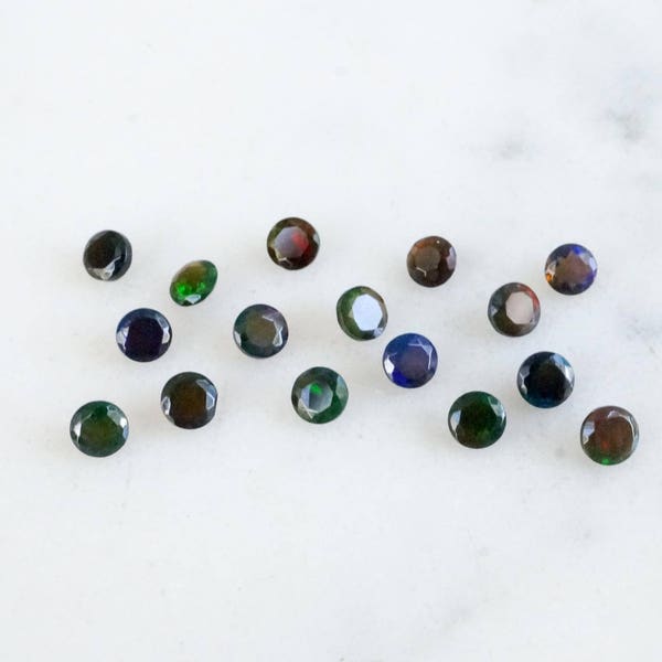 3mm black opal brilliant cut gemstones. glowing radiant black gemstone flashy opal loose gems