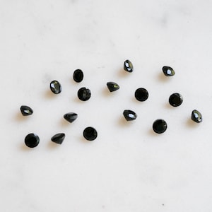 3mm black onyx brilliant cut gemstones. black gemstone loose gems