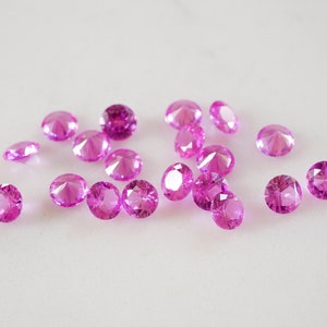 5mm Pink sapphire Gemstones. pink brilliant cut gems. lab grown