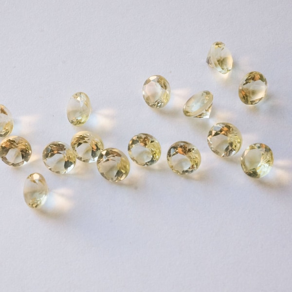 5mm lemon quartz faceted gemstone. light yellow gem. round gem yellow gem brilliant cut