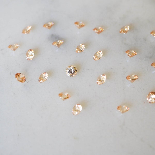 3mm faceted champagne CZ gemstones. Peach round gemstone. loose gems. lab grown