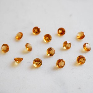 5mm golden citrine faceted gemstone. yellow citrine gem. round gem yellow gem brilliant cut
