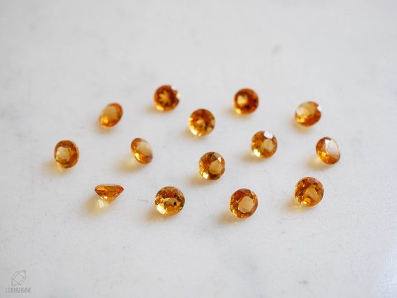 5mm golden citrine faceted gemstone. yellow citrine gem. round gem yellow gem brilliant cut