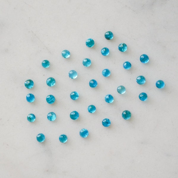 3mm neon apatite smooth polished cabochons. petite blue gems