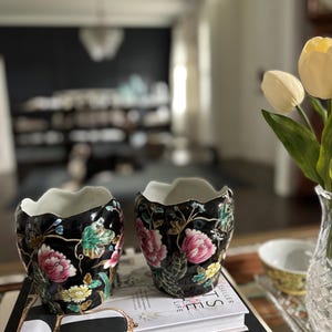 Pair of Vintage Chinese Famille Rose Black Ground Porcelain Cachepots