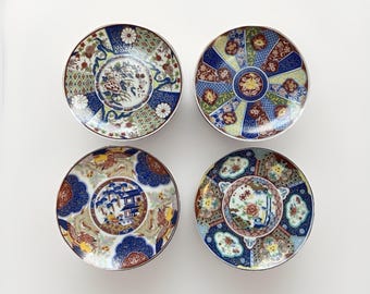 Juego de 4 platos decorativos de porcelana japonesa vintage, fabricados en Japón. Exhibición de pared.