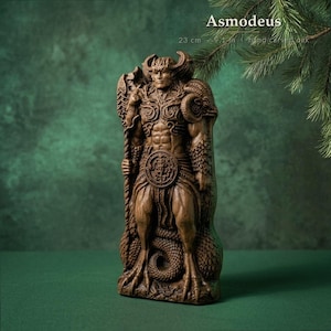 May include: A brown, hand-carved wooden statue of Asmodeus standing 23 cm tall. The figure features a muscular torso, ram-like horns, and clawed feet, holding a staff in one hand. A coiled serpent wraps around the legs and base of the sculpture.