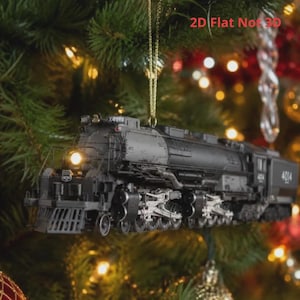 May include: A black steam locomotive Christmas tree ornament featuring the number 4014 on the side and front, with a gold hanging string. The ornament includes the text 2D Flat Not 3D in red, indicating its flat design profile for holiday decoration.