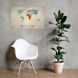 May include: A rectangular wall map titled THE WORLD BY LANGUAGE featuring a beige background with continents colored in shades of blue, green, yellow, orange, and red to represent linguistic regions, including a legend at the bottom.