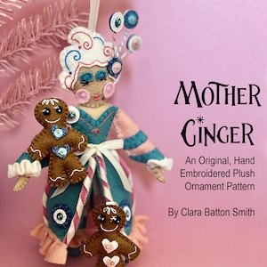 May include: A plush Mother Ginger ornament from the Nutcracker Ornament Collection. The handmade ornament features a doll with a white wig, blue eyes, and a teal and pink dress. Two gingerbread men are attached. The text "Mother Ginger" is visible.