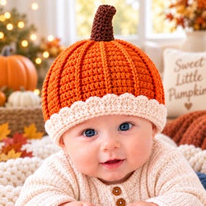 May include: A crochet pumpkin hat featuring a vibrant orange ribbed body, a dark brown stem at the top, and a cream-colored scalloped edge trim. The hat is crafted with a textured stitch pattern that mimics the appearance of a pumpkin.