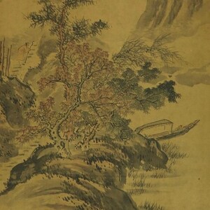 May include: An antique Chinese landscape painting on silk. The artwork depicts a mountainous scene with trees, a boat, and figures. The color palette is muted, with shades of brown, green, and gray. The painting has Chinese characters and seals.
