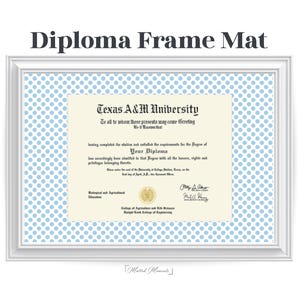 May include: A white picture frame containing a diploma mat with a light blue and white polka dot pattern. The diploma inside displays the text Texas A&M University, Your Diploma, and various signatures. The words Diploma Frame Mat appear above.