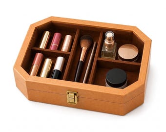 May include: An octagonal wooden storage box with a glass lid and a brass latch, featuring a brown velvet-lined interior divided into compartments. It contains six lipsticks, a makeup brush, a thin cosmetic pencil, a spray bottle, and two jars.
