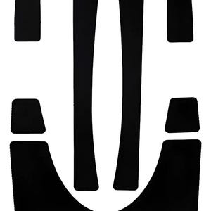 May include: A set of six black adhesive protective pads in various shapes, including two long vertical strips, two small rectangular pieces, and two larger curved pieces, designed for application on a smooth surface for protection.