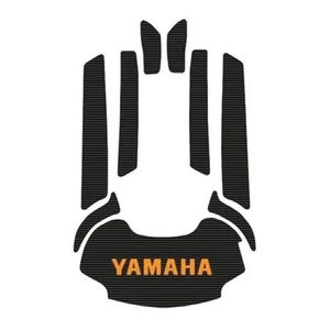 May include: A set of black adhesive decals with a horizontal line texture, arranged in a symmetrical pattern. The design includes several vertical strips and a larger base piece featuring the orange text YAMAHA printed in a bold, sans-serif font.