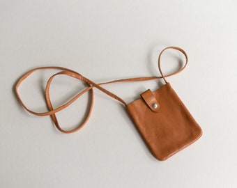 simple small brown leather pocket crossbody bag