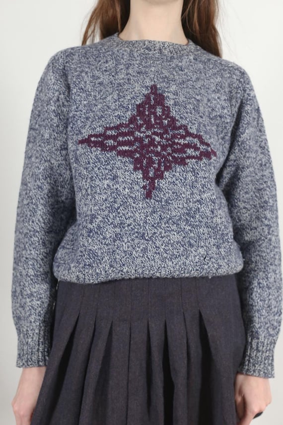 Hand embroidered star on vintage wool sweater
