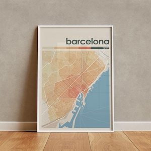 Könnte beinhalten: Ein gerahmter Wandkunstdruck mit einer stilisierten Karte von Barcelona, Spanien. Die Karte zeigt ein Straßennetz in Beige-, Orange- und Rottönen, das sich von einem blauen Küstenbereich abhebt. Der Text barcelona und spain ist oben zu sehen.