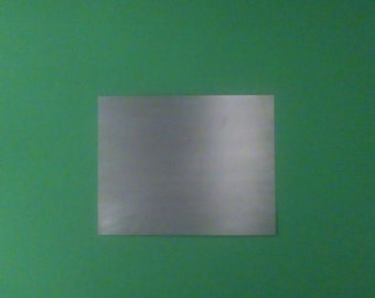 DIY framed magnet board.  Fits a 11" x 14" frame.  Magnetic chalkboard