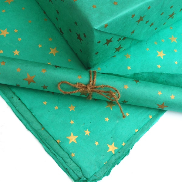 Papier cadeau Lokta, étoiles dorées sur papier fabriqué à la main et commerce équitable, turquoise