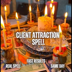 May include: A collection of lit white candles in brown stone holders arranged on a surface covered with tarot cards. A central candle features hand-drawn symbols and the text CLIENT ATTRACTION SPELL, FAST RESULTS, REAL SPELL, SAME DAY.