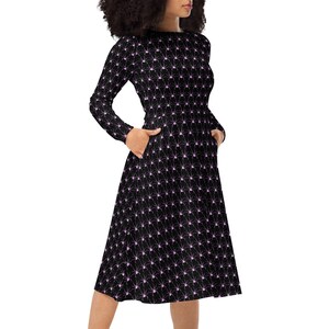 Spiders dress. Long sleeve midi length.