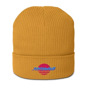Classic ribbed beanie. Synthwave in retro front in bright blue with hot pink shadow over a sunset in hot pink.
6 colours available.
Oxford Navy
Black
Light Avio Blue
Light Grey
Leaf Green
Mustard Yellow.
Mustard yellow shown.