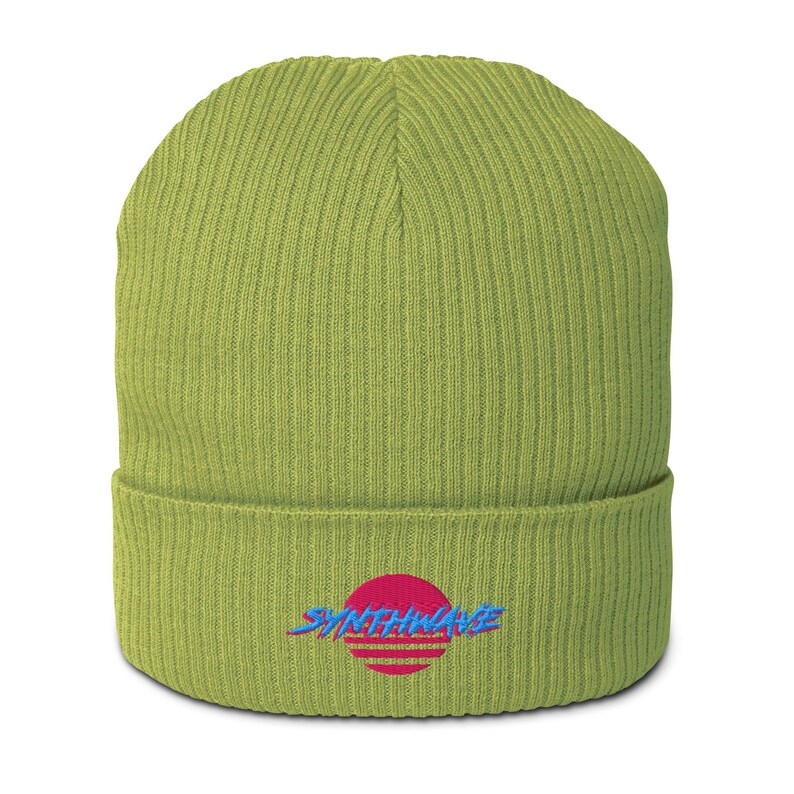 Classic ribbed beanie. Synthwave in retro front in bright blue with hot pink shadow over a sunset in hot pink.
6 colours available.
Oxford Navy
Black
Light Avio Blue
Light Grey
Leaf Green
Mustard Yellow.
Leaf green shown.