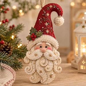 May include: A felt Santa Claus Christmas ornament featuring a tall red hat with embroidered gold stars and vines, a white pom-pom tip, and a holly leaf accent. The face has a thick, swirling white felt beard, mustache, and eyebrows.