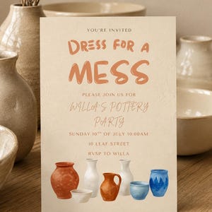 May include: A rectangular invitation card with a cream-colored textured background. The text reads: YOU'RE INVITED DRESS FOR A MESS PLEASE JOIN US FOR WILLA'S POTTERY PARTY SUNDAY 10TH OF JULY 10:00AM 10 LEAF STREET RVSP TO WILLA. Below are illustrations of pottery.