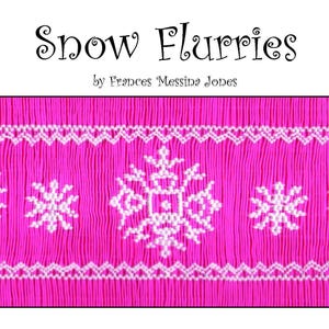 May include: A pink fabric with a white snowflake design. The fabric has a pleated texture. The text "Snow Flurries by Frances Messina Jones" is at the top of the image.