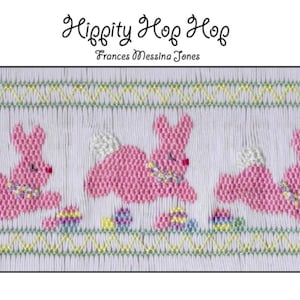 May include: A white embroidery pattern with the title "Hippity Hop Hop" by Frances Messina Jones. The pattern features three pink bunnies hopping over colorful Easter eggs.