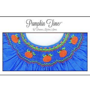 May include: A blue polka-dot garment with a scalloped neckline. The neckline is adorned with orange pumpkins and green stitching. The text "Pumpkin Time" is displayed in elegant script.