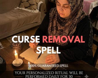 May include: A person wearing a brown patterned headscarf and black long-sleeved top sits at a wooden table with an open book, a pen, and two lit white candles. Text overlays read 30-DAY PERSONALIZED RITUAL, CURSE REMOVAL SPELL, 100% GUARANTEED SPELL.