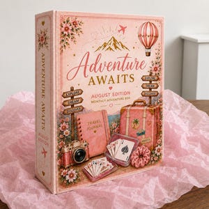May include: A pink rectangular box titled Adventure Awaits August Edition. The cover features illustrations of a hot air balloon, mountains, a travel journal, a camera, a suitcase, playing cards, and a scrunchie, all surrounded by floral accents.