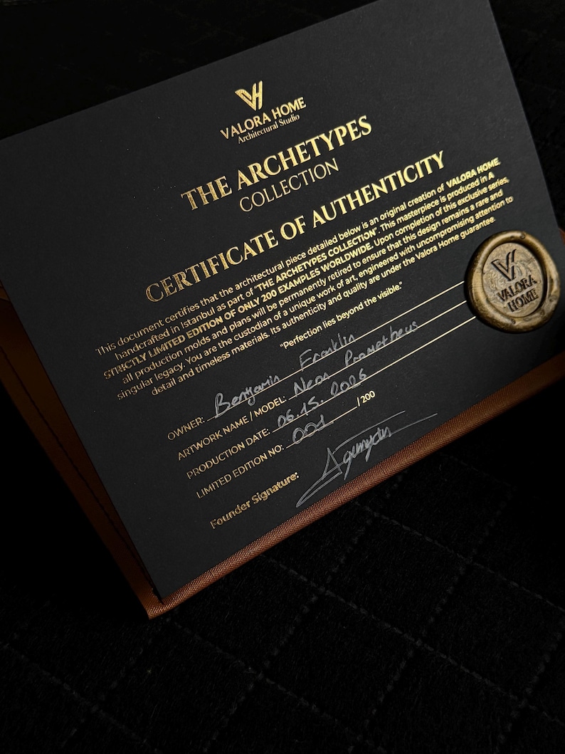 May include: A black certificate of authenticity for The Archetypes Collection by Valora Home. The document features gold text, a gold wax seal with the Valora Home logo, and handwritten details including the owner name, model, date, and edition number.
