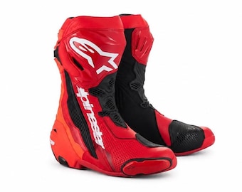 Botas de moto Alpinestars Supertech R para competición, color blanco y negro/piel deportiva.