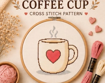 May include: A cross stitch pattern in a wooden embroidery hoop featuring a beige coffee cup with a red heart design and steam rising above it. The text reads HEART COFFEE CUP CROSS STITCH PATTERN and DIGITAL PDF PATTERN with a download icon.