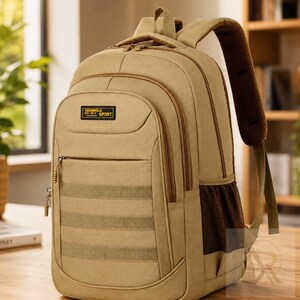 May include: A tan backpack featuring multiple zippered compartments, a top handle, and adjustable padded shoulder straps. The front includes a rectangular black patch with the text XLDOONGLE EST 2010 SPORT and three horizontal webbing straps.
