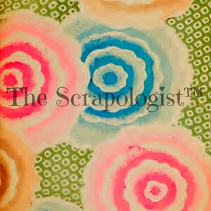 May include: Abstract digital art print featuring a colorful pattern of overlapping circles in shades of pink, blue, green, and brown. The circles have a concentric design with white outlines. The text "The Scrapologist&trade;" is visible in the center of the image.