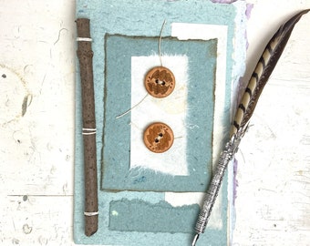 Art Journal with Handmade Paper Cover, Variety of Mixed Media Pages, Hand Sewn Binding with Stick Inserted - buttons on cover