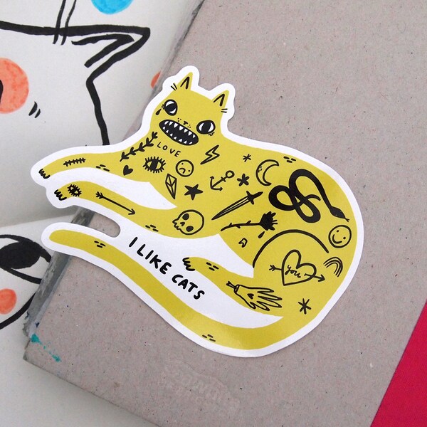 Yellow cat with tattoos vinyl stickers