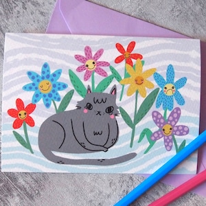 Cat and flowers greetings card
