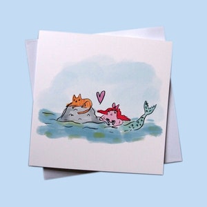 Carte de voeux illustrée d'un chat et d'une sirène, vierge à l'intérieur
