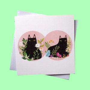 Carte de voeux chats noirs, vierge à l'intérieur