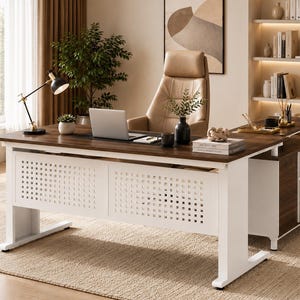 May include: An L-shaped executive desk featuring a dark wood grain top and a white base with a decorative square-patterned front panel. The desk includes an integrated side storage unit with drawers and a matching white frame, providing a workspace.