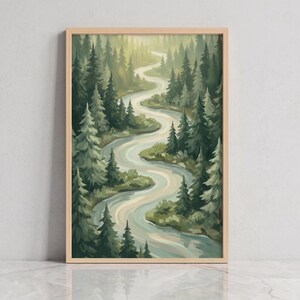 May include: A vertical rectangular wall art print in a light wood frame featuring a painting of a winding river flowing through a dense forest of evergreen trees. The scene uses a palette of muted greens, soft blues, and pale yellow light.