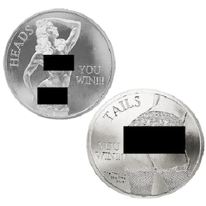 May include: A silver-colored round coin featuring a figure on the heads side with the text HEADS YOU WIN!!! and a figure on the tails side with the text TAILS YOU WIN!!! and One Troy Oz 999 Fine Silver printed on the lower portion of the coin.