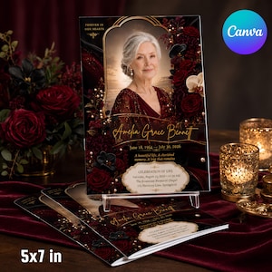May include: A 5x7 inch funeral program featuring a portrait of an older woman with grey hair, surrounded by deep red roses and dark foliage. The text reads Amelia Grace Bennett, June 18, 1954 - July 30, 2026, and Celebration of Life details.